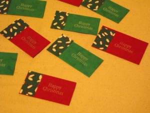 Scraps of card and fabric can be used to make gift tags